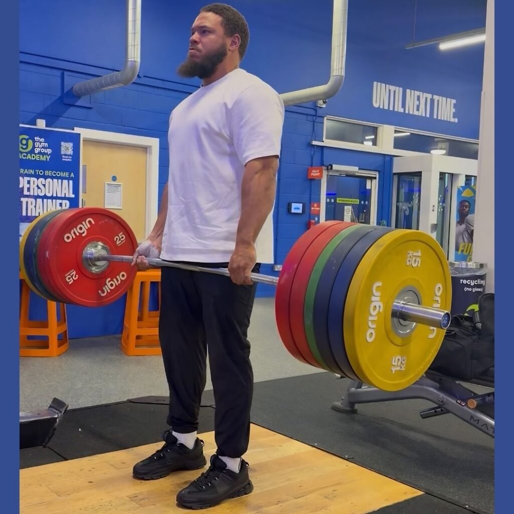 Ibrahim lifting weights, strength training coach for Muslim men